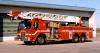 Photo of Thibault serial T83-135, a 1983 Kenworth quint of the Gloucester Fire Department in Ontario.