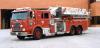 Photo of Thibault serial T88-158, a 1989 White GMC quint of the Burlington Fire Department in Ontario.